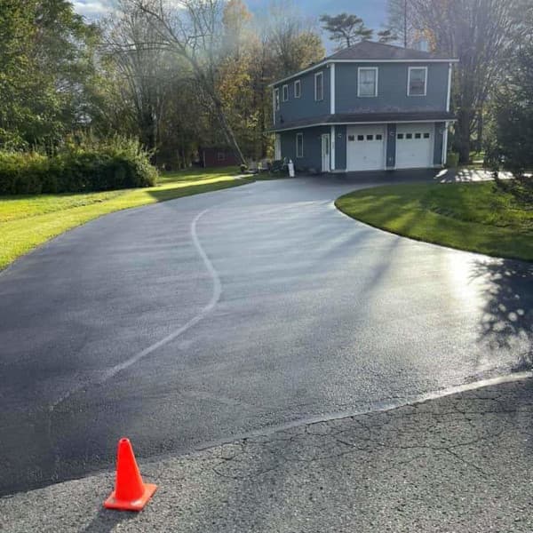 wet sealcoating on driveway